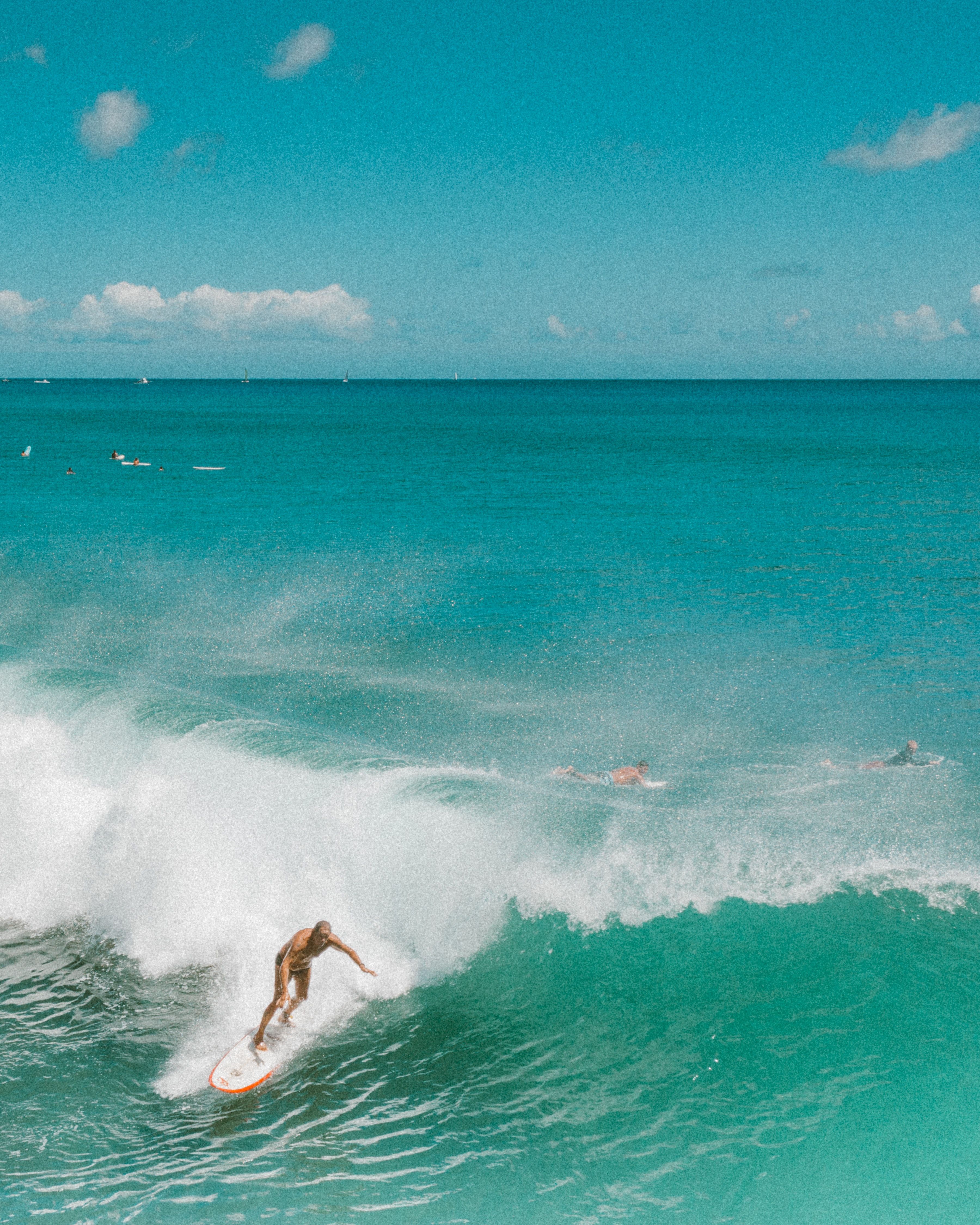 Man surfing a wave.